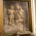 ...la seconda  il quattrocentesco bassorilievo della Madonna della Neve, che con un saio a grosse pieghe scanalate regge alla sua destra il Bambinello in piedi, nudo. Sotto di loro sono disegnati una chiesa e un campanile, a ricordo del miracolo della neve ad agosto: quello che nel IV secolo convinse Papa Liberio ad erigere la famosa basilica romana dedicata alla Madre di Dio